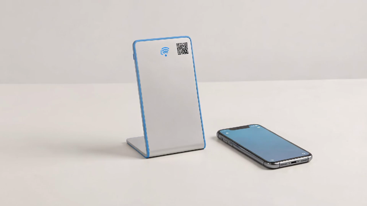 A phone taps a TapiScan NFC and QR stand, then opens the right digital page.